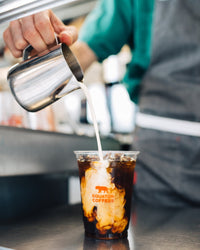 Serving cafe cold brew coffee at Equator Coffees